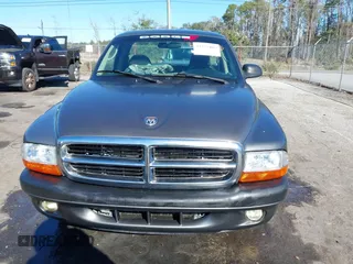 2001 Dodge Dakota with VIN 1B7FL26X91S342103, listed as a IAAI auction lot 41277465 with 157,993 mi miles. Bid and sale history available at carsss.com. Image 12.
