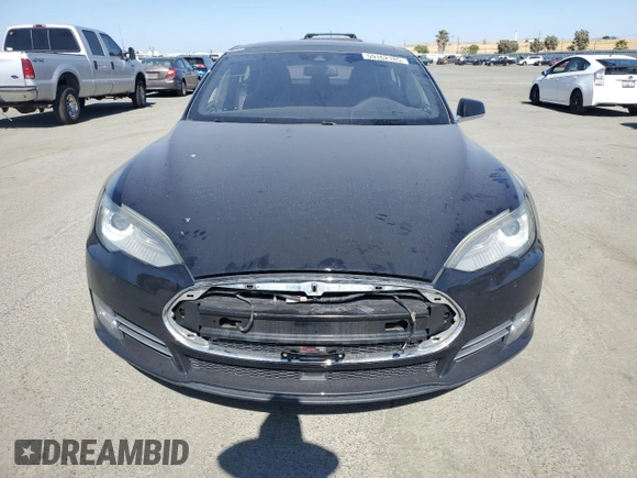 2016 Tesla Model S 90D with VIN 5YJSA1E2XGF129106, listed as a Copart auction lot 59162185 with 136,004 mi miles and Salvage title. Bid and sale history available at DreamBid. Image 5.