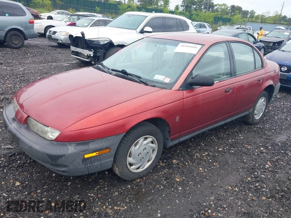 1997 Saturn SL with VIN 1G8ZF5289VZ138039, listed as a IAAI auction lot 39432871 with 125,022 mi miles. Bid and sale history available at carsss.com. Image 2.