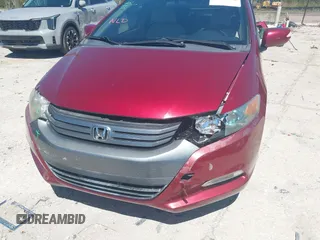 2010 Honda Insight EX with VIN JHMZE2H71AS021062, listed as a IAAI auction lot 41857350 with 45,558 mi miles and . Bid and sale history available at carsss.com. Image 6.