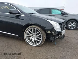 2014 Cadillac XTS Platinum with VIN 2G61W5S84E9291640, listed as a IAAI auction lot 41877867 with 100,462 mi miles and . Bid and sale history available at DreamBid. Image 19.