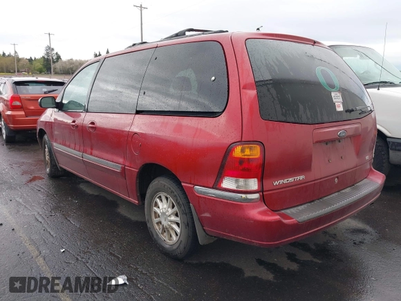 1999 Ford Windstar SE with VIN 2FMZA5244XBA09421, listed as a IAAI auction lot 41973187 with 217,545 mi miles and . Bid and sale history available at DreamBid. Image 3.