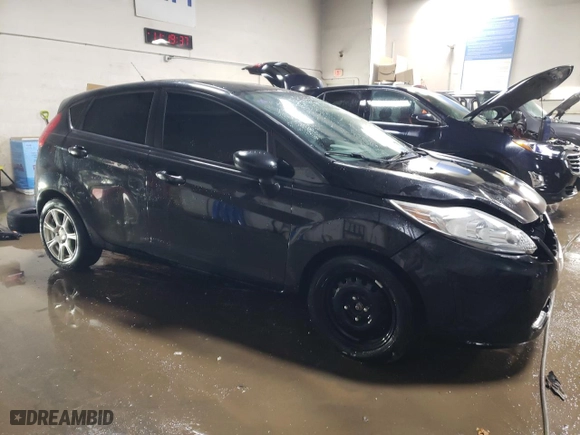 2012 Ford Fiesta SE with VIN 3FADP4EJ3CM132215, listed as a Copart auction lot 47667815 with 187,024 mi miles and Salvage Title. Bid and sale history available at carsss.com. Image 4.