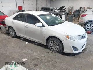 2014 Toyota Camry L with VIN 4T1BF1FK4EU763009, listed as a IAAI auction lot 41615134 with 165,293 mi miles and . Bid and sale history available at carsss.com. Image 1.