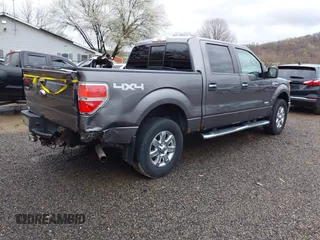 2014 Ford F-150 XL with VIN 1FTFW1ET8EFB75196, listed as a IAAI auction lot 41945260 with 319,194 mi miles. Bid and sale history available at carsss.com. Image 4.