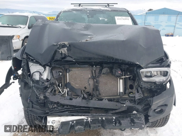 2023 Toyota Tacoma SR5 z VIN 3TMDZ5BN3PM169160, wystawiony jako IAAI lot #41276992 z przebiegiem 5 228 mil mil oraz . Historia ofert i sprzedaży dostępna na DreamBid. Obrazek 13.