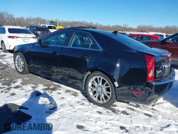 2013 Cadillac CTS Premium z VIN 1G6DS5E34D0160676, wystawiony jako IAAI lot #41262795 z przebiegiem 122 248 mil mil oraz . Historia ofert i sprzedaży dostępna na DreamBid. Obrazek 3.