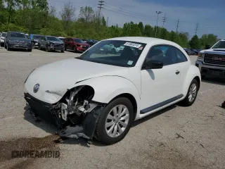 2013 Volkswagen Beetle Entry with VIN 3VWFP7AT2DM671418, listed as a Copart auction lot 51565374 with 106,080 mi miles and Salvage Title. Bid and sale history available at DreamBid. Image 1.