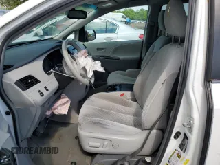 2014 Toyota Sienna LE AAS with VIN 5TDKK3DC6ES497746, listed as a Copart auction lot 56125845 with 142,596 mi miles and Salvage Title. Bid and sale history available at DreamBid. Image 7.