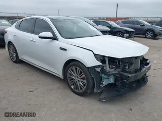2018 Kia Optima SX with VIN 5XXGV4L22JG233821, listed as a IAAI auction lot 41093826 with 103,046 mi miles. Bid and sale history available at carsss.com. Image 1.
