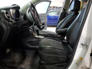 2015 Chevrolet Trax LT with VIN KL7CJRSB3FB223530, listed as a Copart auction lot 81809844 with 98,631 mi miles and Salvage Title. Bid and sale history available at DreamBid. Image 7.