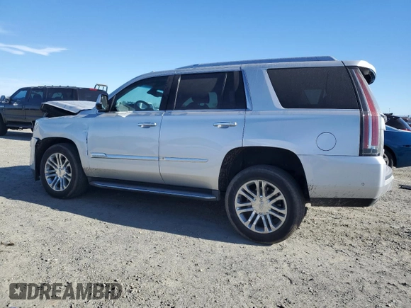 2018 Cadillac Escalade z VIN 1GYS4AKJ9JR305660, wystawiony jako Copart lot #87519795 z przebiegiem 36 483 mil mil oraz Szkoda całkowita • Salvage title. Historia ofert i sprzedaży dostępna na DreamBid. Obrazek 2.