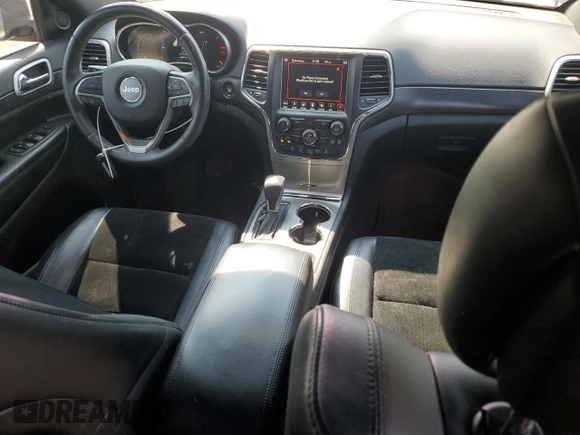 2018 Jeep Grand Cherokee Laredo E with VIN 1C4RJFAG9JC390597, listed as a Copart auction lot 71450474 with 69,645 mi miles and Salvage title. Bid and sale history available at DreamBid. Image 8.