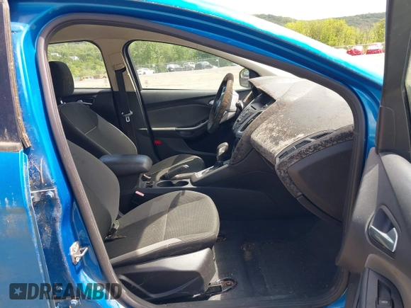 2012 Ford Focus SE z VIN 1FAHP3K29CL230126, wystawiony jako IAAI lot #42306310 z przebiegiem 143 981 mil mil oraz . Historia ofert i sprzedaży dostępna na DreamBid. Obrazek 5.