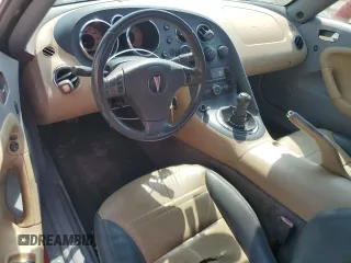 2007 Pontiac Solstice z VIN 1G2MB35BX7Y137681, wystawiony jako Copart lot #67002804 z przebiegiem 133 295 mil mil oraz Szkoda całkowita • Salvage title. Historia ofert i sprzedaży dostępna na DreamBid. Obrazek 8.