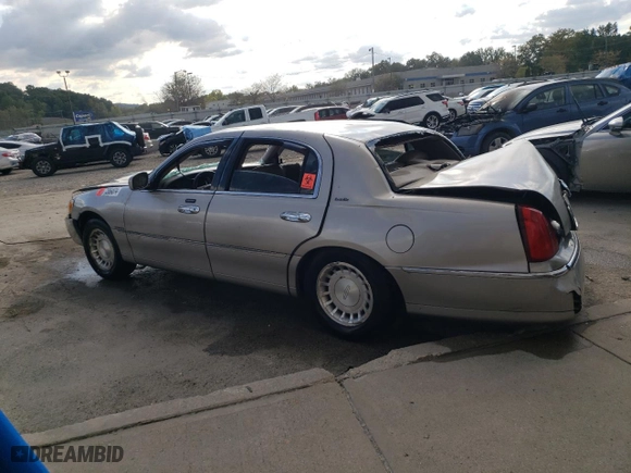 2002 Lincoln Town Car Executive with VIN 1LNHM81W32Y663460, listed as a Copart auction lot 72064874 with 153,251 mi miles and Salvage Title. Bid and sale history available at carsss.com. Image 2.
