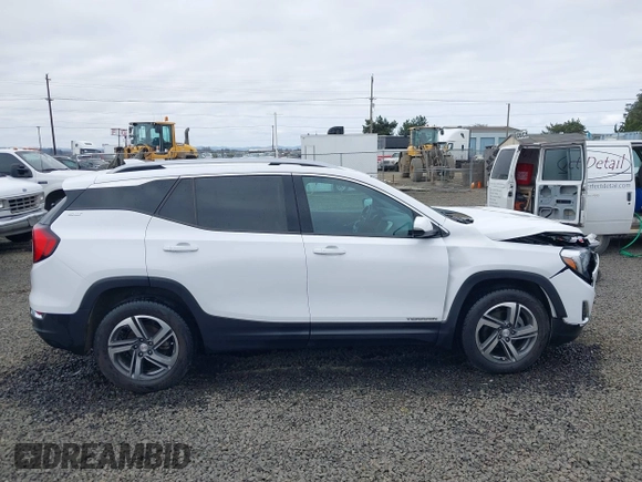2020 GMC Terrain SLT z VIN 3GKALVEVXLL143417, wystawiony jako IAAI lot #41714662 z przebiegiem 97 634 mil mil oraz . Historia ofert i sprzedaży dostępna na DreamBid. Obrazek 13.
