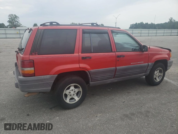 1998 Jeep Grand Cherokee Laredo with VIN 1J4FX58S3WC144684, listed as a Copart auction lot 67226694 with 106,602 mi miles and Clean Title. Bid and sale history available at carsss.com. Image 3.