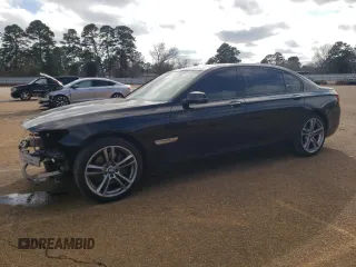 2015 BMW 7 Series 740Li with VIN WBAYE4C55FD947147, listed as a Copart auction lot 43274705 with 194,914 mi miles and Salvage Title. Bid and sale history available at DreamBid. Image 1.