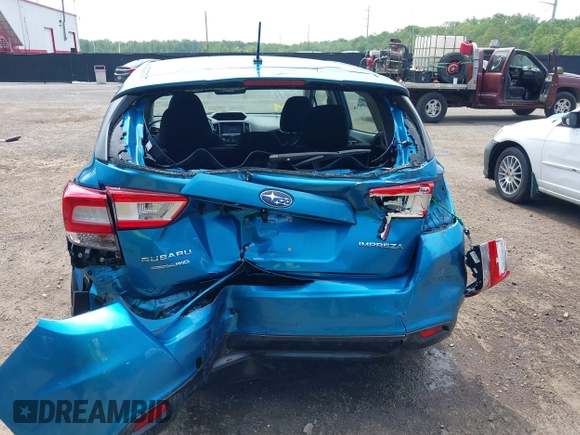 2018 Subaru Impreza with VIN 4S3GTAA69J3723926, listed as a IAAI auction lot 42129469 with 61,167 mi miles and . Bid and sale history available at DreamBid. Image 16.