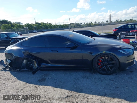 2023 Tesla Model S Plaid с VIN 5YJSA1E62PF530538, выставлен на аукционе IAAI как лот 41553415 с пробегом 31 392 миль миль и . История ставок и продаж доступна на DreamBid. Изображение 13.