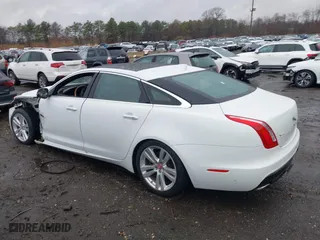 2017 Jaguar XJ with VIN SAJWA2G73H8W04310, listed as a IAAI auction lot 40914491 with 62,102 mi miles. Bid and sale history available at carsss.com. Image 14.