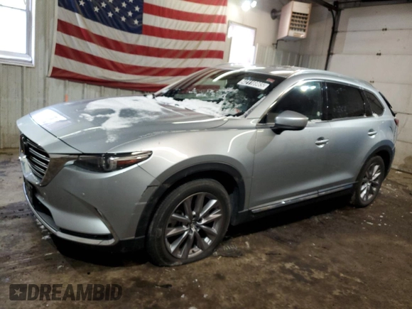 2023 Mazda CX-9 Carbon Edition with VIN JM3TCBDY0P0646754, listed as a Copart auction lot 42116965 with 34,519 mi miles and Clean Title. Bid and sale history available at carsss.com. Image 1.