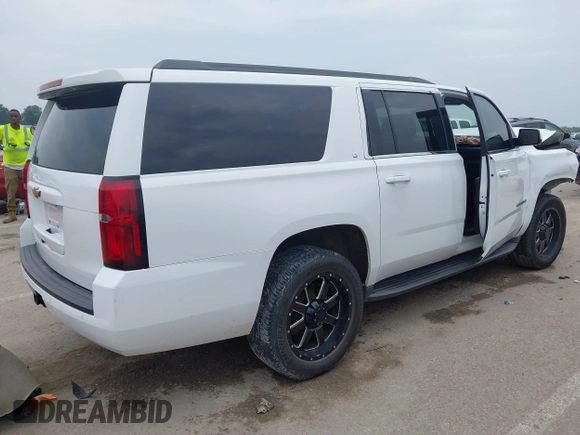 2016 Chevrolet Suburban LT with VIN 1GNSKHKC9GR263027, listed as a IAAI auction lot 42463711 with Not provided miles and . Bid and sale history available at DreamBid. Image 4.