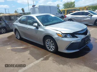 2022 Toyota Camry LE with VIN 4T1C11AK0NU640401, listed as a IAAI auction lot 42181200 with 41,025 mi miles and . Bid and sale history available at DreamBid. Image 1.