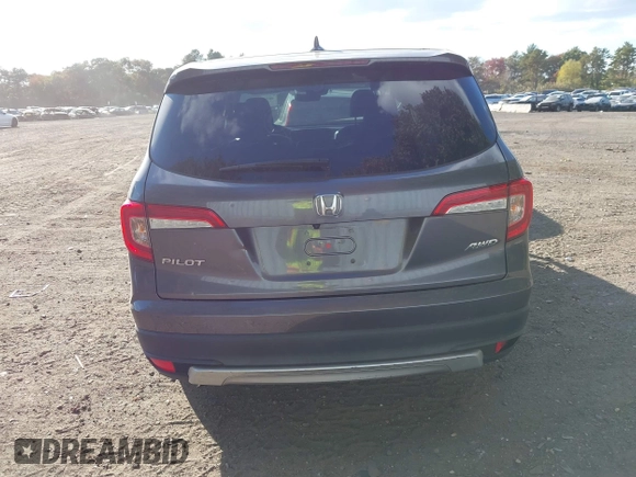 2020 Honda Pilot EX-L z VIN 5FNYF6H53LB069677, wystawiony jako IAAI lot #40581586 z przebiegiem 21 717 mil mil oraz . Historia ofert i sprzedaży dostępna na DreamBid. Obrazek 17.