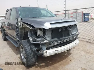 2014 Toyota Tundra SR5 z VIN 5TFEM5F1XEX082020, wystawiony jako IAAI lot #41914391 z przebiegiem 75 787 mil mil oraz . Historia ofert i sprzedaży dostępna na DreamBid. Obrazek 6.