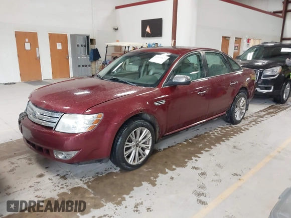 2008 Ford Taurus Limited with VIN 1FAHP28W28G153930, listed as a IAAI auction lot 42154827 with 243,386 mi miles. Bid and sale history available at carsss.com. Image 2.