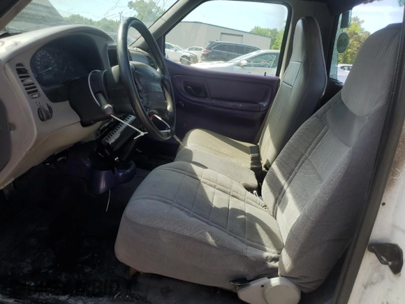 1999 Ford Ranger XL with VIN 1FTYR10C2XTB02854, listed as a Copart auction lot 54534185 with 172,616 mi miles and Salvage Title. Bid and sale history available at DreamBid. Image 7.