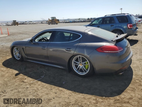 2014 Porsche Panamera S E-Hybrid z VIN WP0AD2A78EL044818, wystawiony jako Copart lot #65864484 z przebiegiem 141 423 mil mil oraz Szkoda całkowita • Salvage title. Historia ofert i sprzedaży dostępna na DreamBid. Obrazek 2.