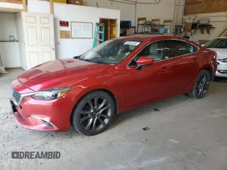 2016 Mazda 6 i Grand Touring с VIN JM1GJ1W59G1471461, выставлен на аукционе Copart как лот 59684355 с пробегом 156 485 миль миль и Списание • Salvage title. История ставок и продаж доступна на DreamBid. Изображение 1.