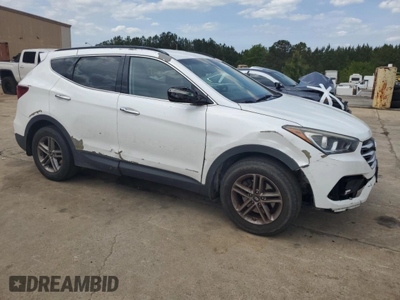 2018 Hyundai Santa Fe 2.4L z VIN 5NMZUDLB9JH095157, wystawiony jako Copart lot #53546725 z przebiegiem 128 840 mil mil oraz Szkoda całkowita • Salvage title. Historia ofert i sprzedaży dostępna na DreamBid. Obrazek 4.