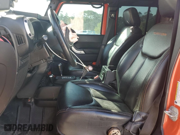 2015 Jeep Wrangler Unlimited Rubicon Hard Rock z VIN 1C4HJWFG7FL690098, wystawiony jako Copart lot #47431555 z przebiegiem 95 138 mil mil oraz Szkoda całkowita • Salvage title. Historia ofert i sprzedaży dostępna na DreamBid. Obrazek 7.