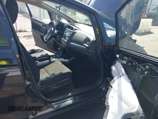 2016 Honda Fit LX with VIN JHMGK5H57GS010902, listed as a IAAI auction lot 41902395 with 124,531 mi miles. Bid and sale history available at carsss.com. Image 5.