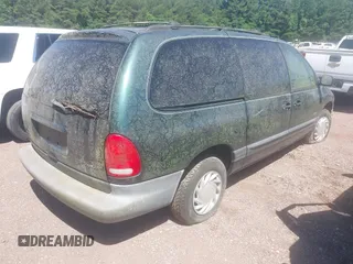 1998 Plymouth Voyager SE z VIN 1P4GP44G3WB563657, wystawiony jako IAAI lot #42306338 z przebiegiem 109 205 mil mil oraz . Historia ofert i sprzedaży dostępna na DreamBid. Obrazek 4.
