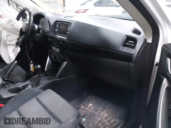 2014 Mazda CX-5 Touring with VIN JM3KE4CY4E0349034, listed as a IAAI auction lot 41478954 with 117,502 mi miles. Bid and sale history available at carsss.com. Image 5.