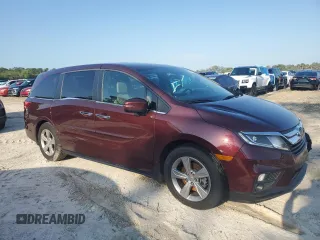 2018 Honda Odyssey EX-L with VIN 5FNRL6H72JB074980, listed as a Copart auction lot 51041465 with 96,240 mi miles and Salvage Title. Bid and sale history available at DreamBid. Image 4.