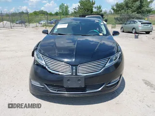 2016 Lincoln MKZ z VIN 3LN6L2J93GR632474, wystawiony jako IAAI lot #42607060 z przebiegiem 99 490 mil mil oraz . Historia ofert i sprzedaży dostępna na DreamBid. Obrazek 12.