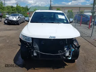 2014 Jeep Grand Cherokee Limited with VIN 1C4RJFBG3EC350648, listed as a IAAI auction lot 42523221 with 125,447 mi miles and . Bid and sale history available at DreamBid. Image 6.