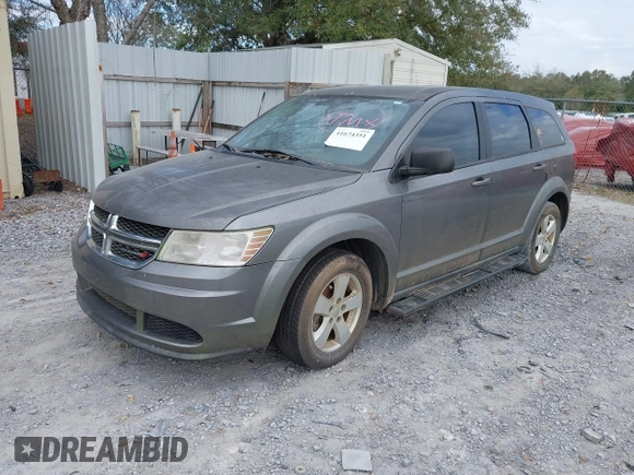 2013 Dodge Journey SE z VIN 3C4PDCAB2DT577805, wystawiony jako IAAI lot #41674351 z przebiegiem 183 006 mil mil oraz . Historia ofert i sprzedaży dostępna na DreamBid. Obrazek 2.