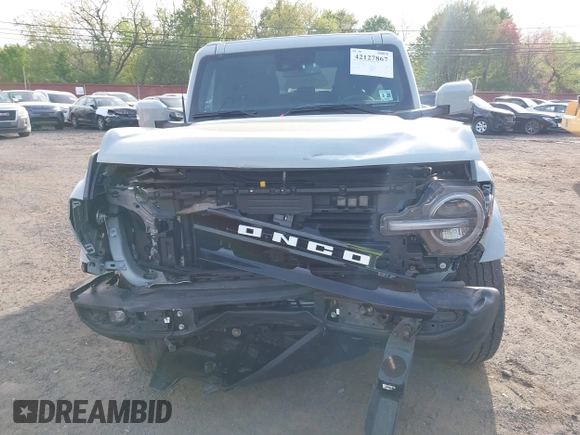 2023 Ford Bronco with VIN 1FMDE5BH3PLA90591, listed as a IAAI auction lot 42127867 with 34,616 mi miles and . Bid and sale history available at DreamBid. Image 6.