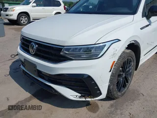 2022 Volkswagen Tiguan SE R-Line Black with VIN 3VV8B7AX0NM007523, listed as a IAAI auction lot 42457688 with 39,084 mi miles and . Bid and sale history available at DreamBid. Image 6.