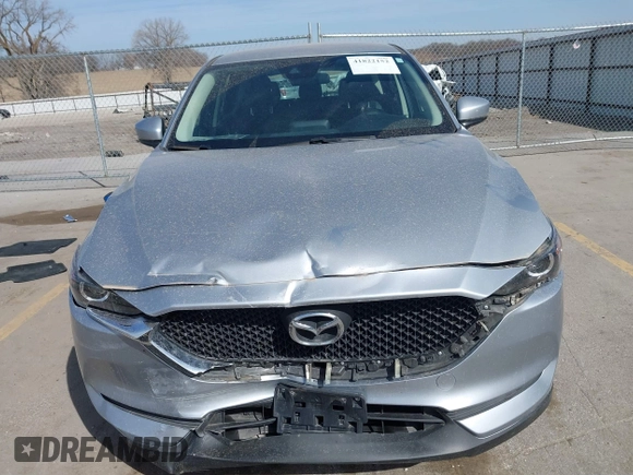 2019 Mazda CX-5 Sport with VIN JM3KFBBM6K1582760, listed as a IAAI auction lot 41822152 with 60,620 mi miles and . Bid and sale history available at DreamBid. Image 12.