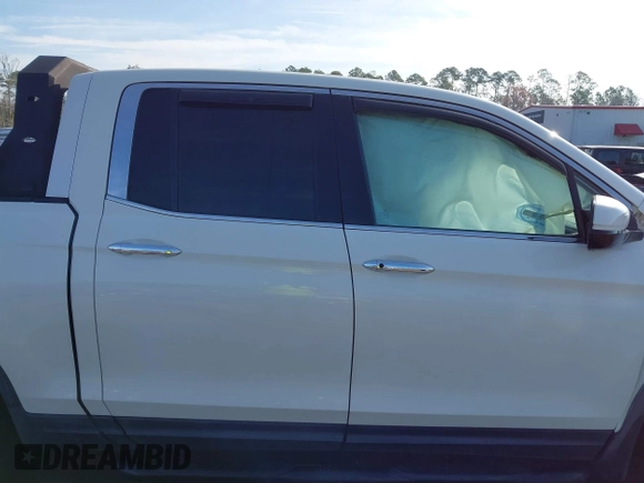 2018 Honda Ridgeline RTL-E with VIN 5FPYK3F71JB001753, listed as a IAAI auction lot 41510248 with 84,551 mi miles and . Bid and sale history available at DreamBid. Image 13.