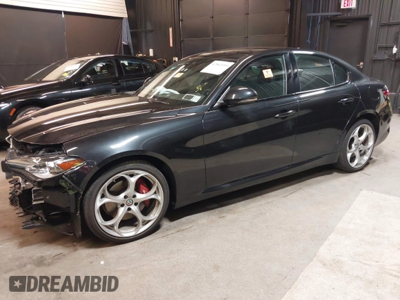 2021 Alfa Romeo Giulia Ti z VIN ZARFANBN7M7644482, wystawiony jako IAAI lot #42502199 z przebiegiem 27 962 mil mil oraz . Historia ofert i sprzedaży dostępna na DreamBid. Obrazek 20.