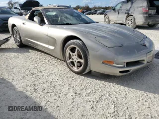2000 Chevrolet Corvette with VIN 1G1YY32GXY5124274, listed as a Copart auction lot 77097974 with 0 mi miles and Salvage Title. Bid and sale history available at carsss.com. Image 4.